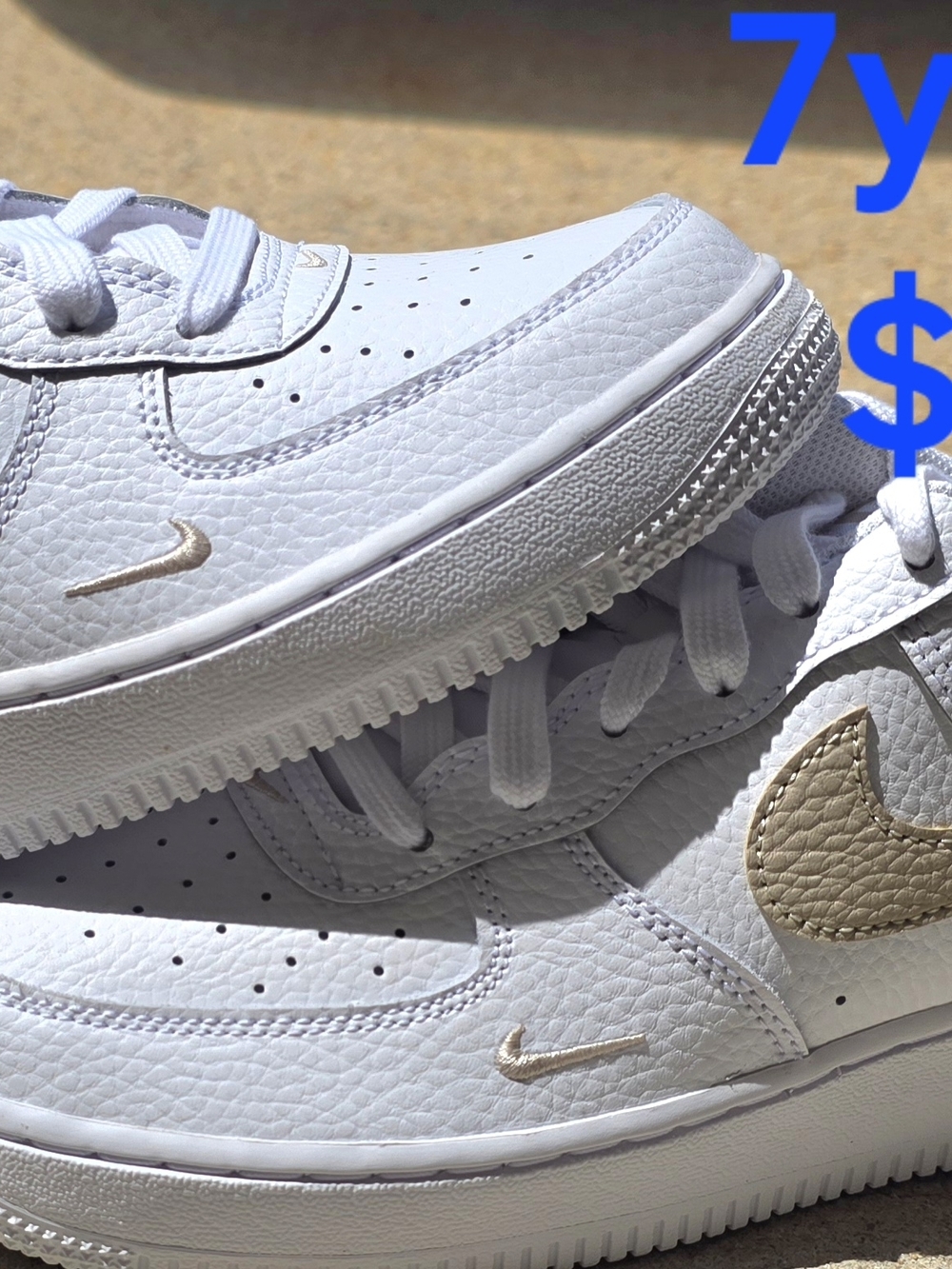 Nike White Low-Top Sneakers with Cream Swoosh